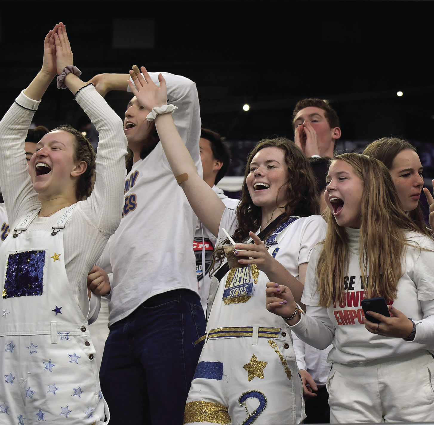 Holy Angels fans cheer